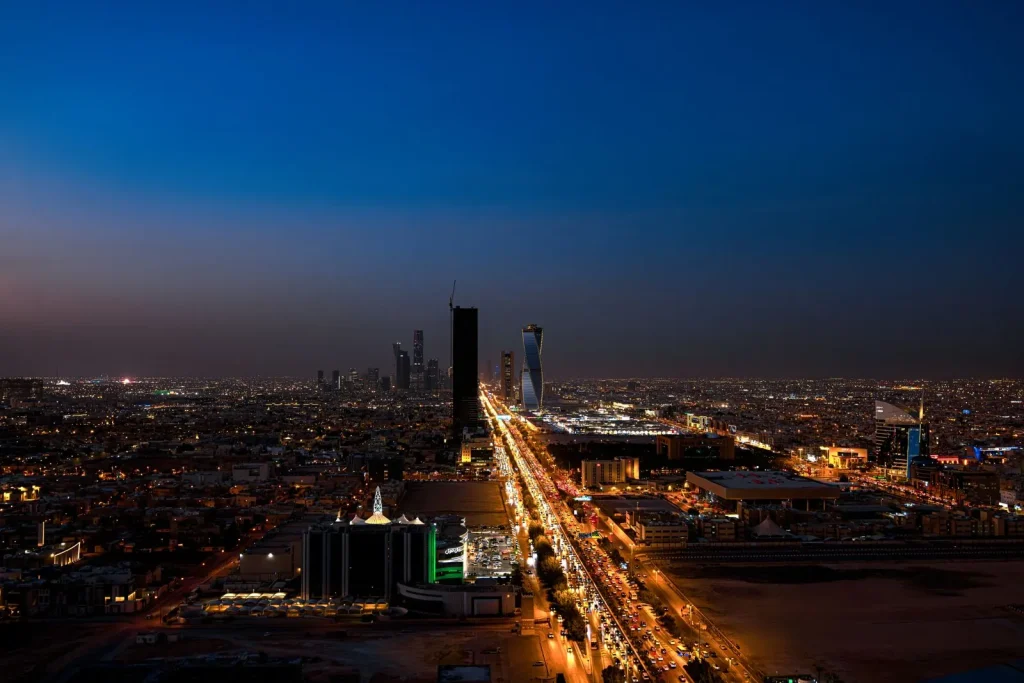 Aerial view of Riyadh at twilight with lit streets